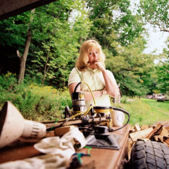 woman looking at junk